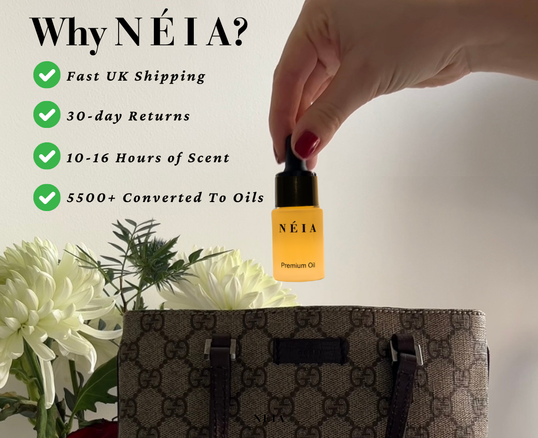 Néia premium oil bottle with a hand holding it, next to a floral arrangement and a handbag.
