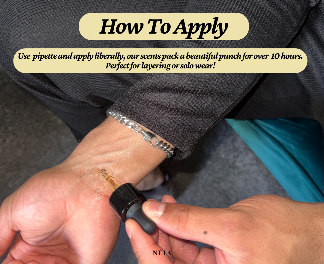 Hand applying NÉIA perfume oil to pulse points, showcasing easy and precise roll-on design
