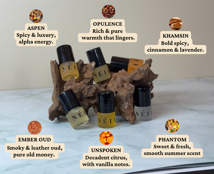 Set of small NÉIA bottles with labels on a textured surface