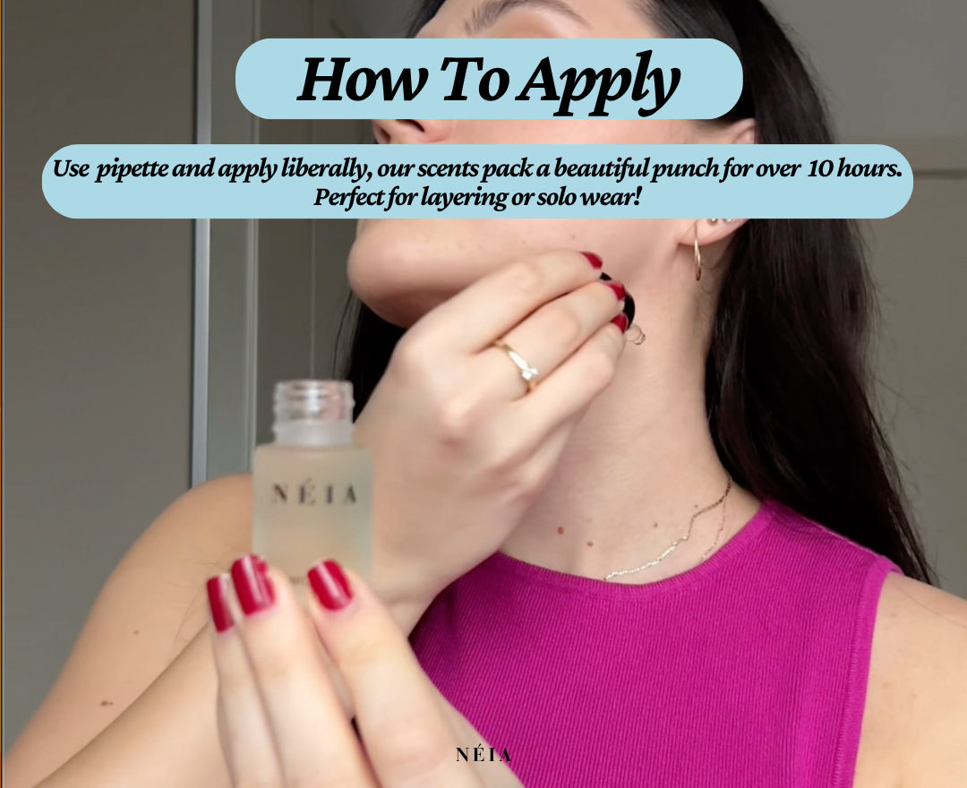 Hand applying NÉIA perfume oil to pulse points, showcasing easy and precise roll-on design