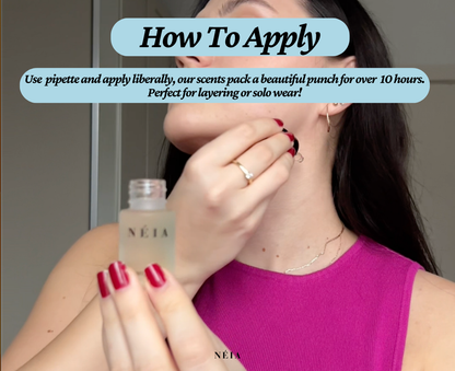 Hand applying NÉIA perfume oil to pulse points, showcasing easy and precise roll-on design