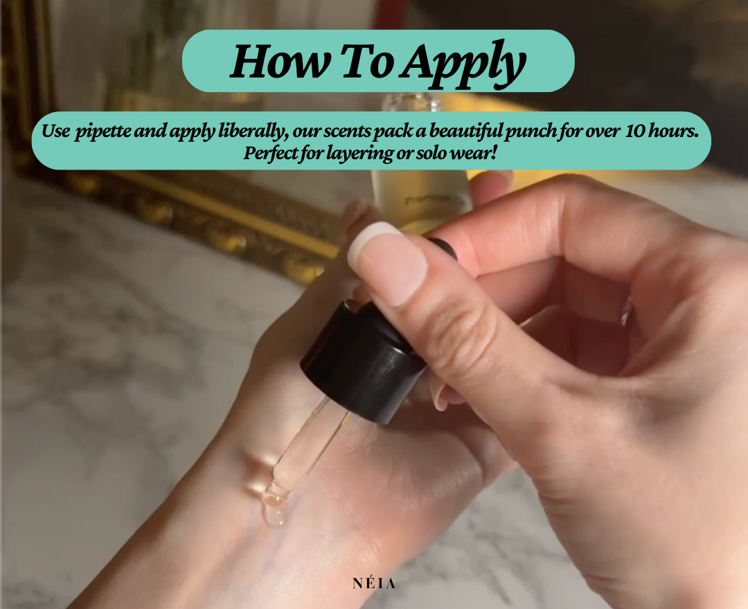 Hand applying NÉIA perfume oil to pulse points, showcasing easy and precise roll-on design

