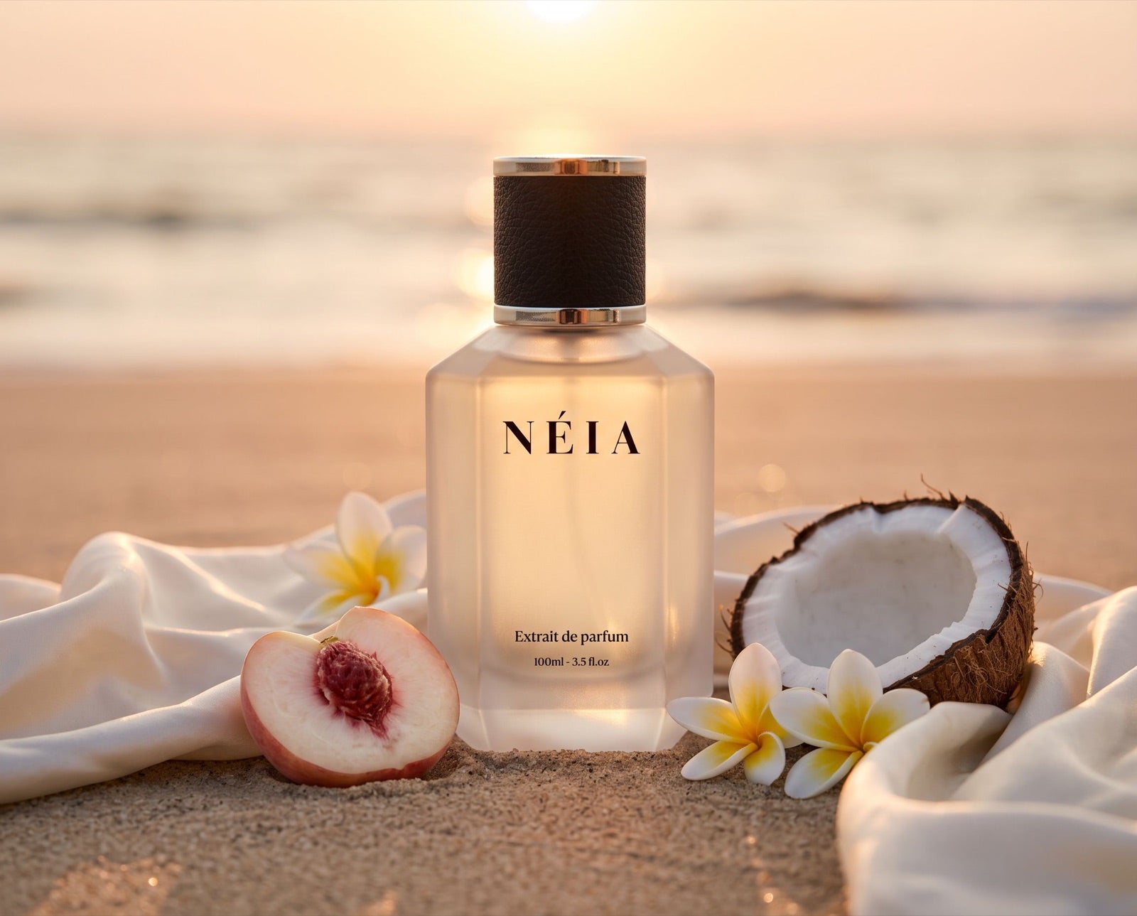 Silk Musk 100ml on the sand at sunset with peach and coconut